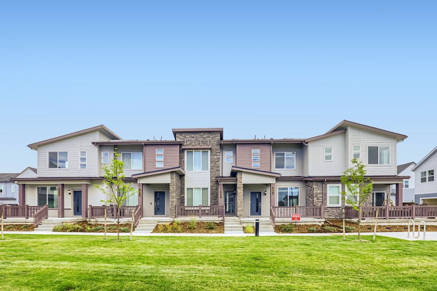 Front exterior of a new home in Vermilion Creek, Centennial, CO, highlighting curb appeal (Image 1). Front exterior of a new home in Vermilion Creek, Centennial, CO, highlighting curb appeal (Image 1).