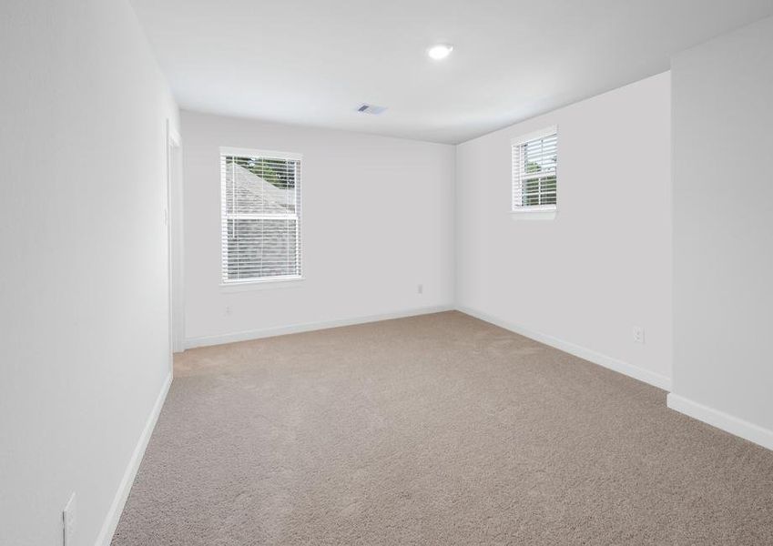 Secondary bedroom with carpet