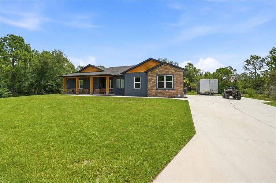 Front exterior of a new home in , Punta Gorda, FL, highlighting curb appeal (Image 22). Front exterior of a new home in , Punta Gorda, FL, highlighting curb appeal (Image 22).
