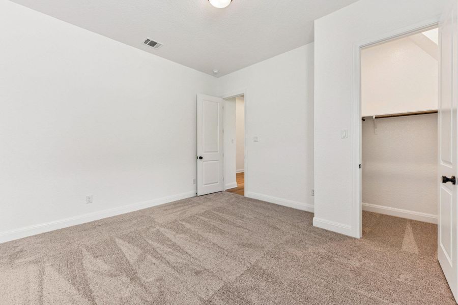 Spacious, unfurnished interior of a new home in 6 Creeks, Kyle (Image 29).