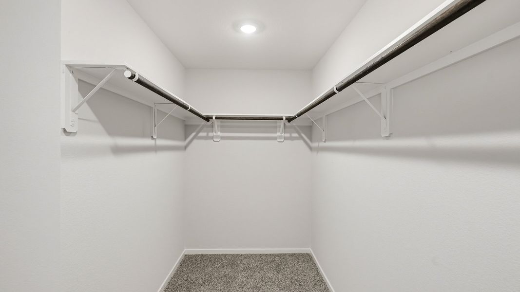 Spacious, unfurnished interior of a new home in Sunterra, Katy (Image 19).