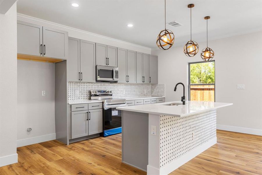 Bathroom with hardwood / wood-style floors, walk in shower, and toilet