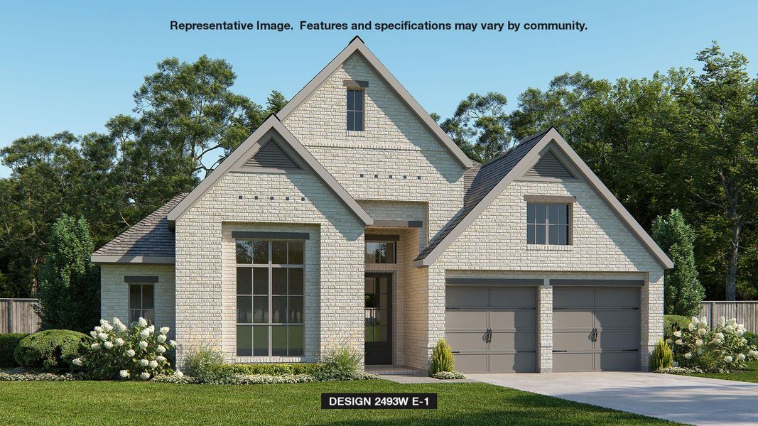 View of front of property featuring brick siding, a garage, driveway, and a front yard
