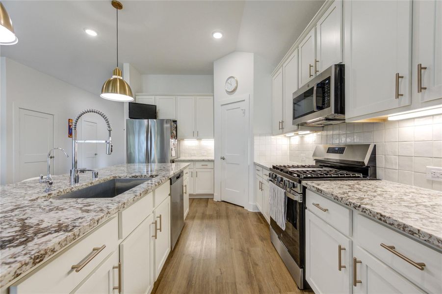 Furnished interior view inside a new home in Marvida, Cypress (Image 13).