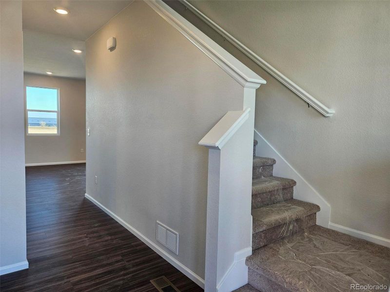 Spacious, unfurnished interior of a new home in The Cottages Collection at Ridgeline Vista, Brighton (Image 14). Spacious, unfurnished interior of a new home in The Cottages Collection at Ridgeline Vista, Brighton (Image 14).