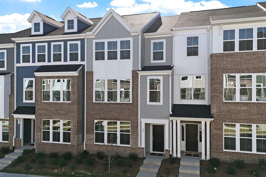 Front exterior of a new home in Renaissance at White Oak, Garner, NC, highlighting curb appeal (Image 22).