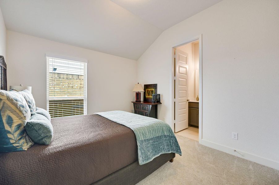Dedicated guest bedroom with a private en-suite bathroom.