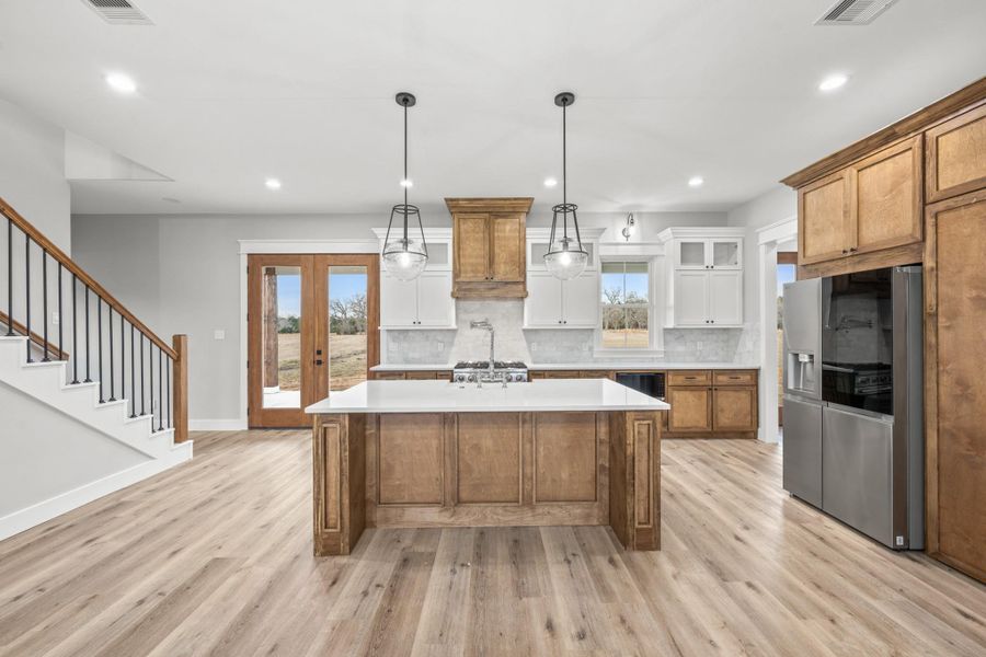Furnished interior view inside a new home in , New Waverly (Image 34).