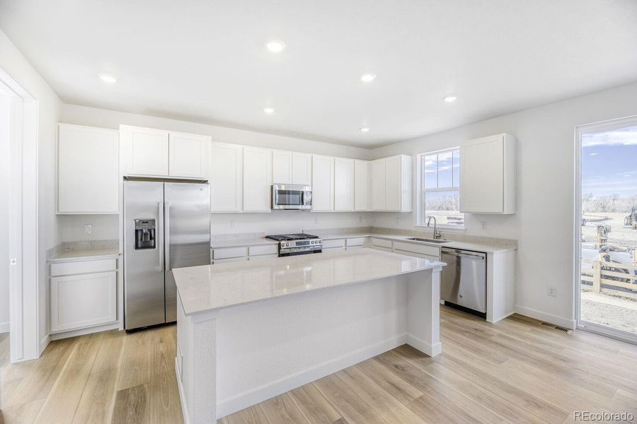 Furnished interior view inside a new home in Vermilion Creek, Centennial (Image 4).
