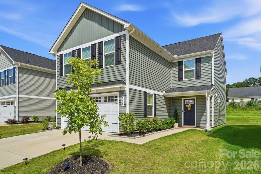 Front exterior of a new home in , Charlotte, NC, highlighting curb appeal (Image 21). Front exterior of a new home in , Charlotte, NC, highlighting curb appeal (Image 21).