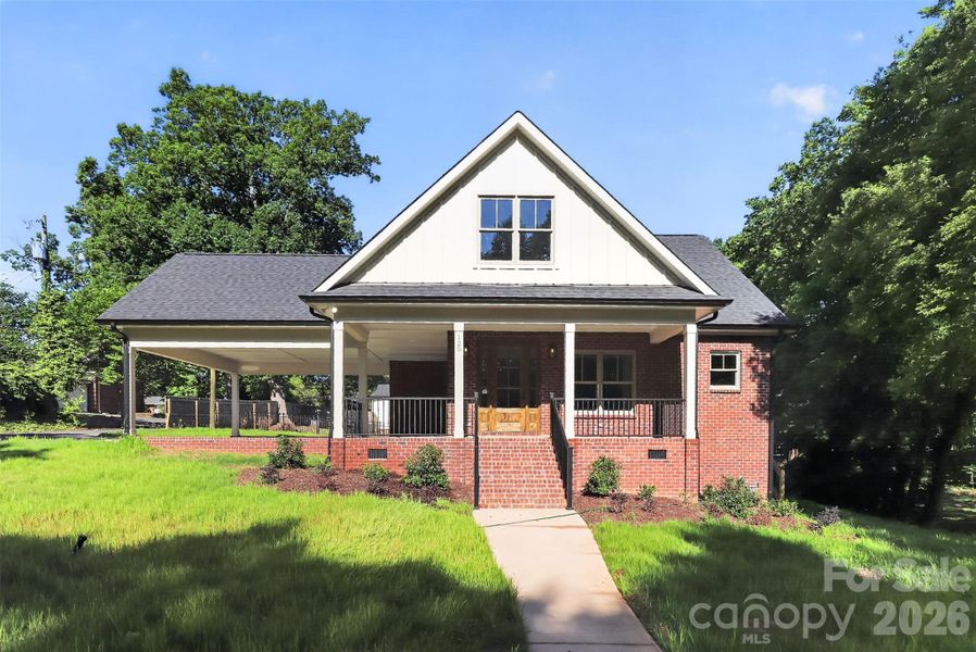 Front exterior of a new home in , Monroe, NC, highlighting curb appeal (Image 1). Front exterior of a new home in , Monroe, NC, highlighting curb appeal (Image 1).