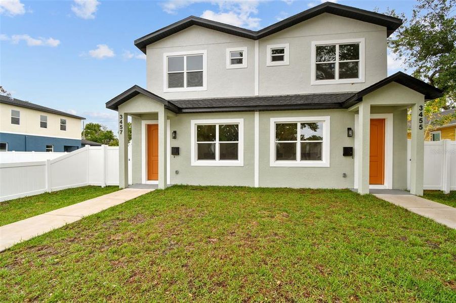 Front exterior of a new home in , St. Petersburg, FL, highlighting curb appeal (Image 23). Front exterior of a new home in , St. Petersburg, FL, highlighting curb appeal (Image 23).