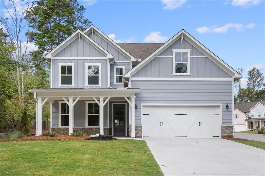 Front exterior of a new home in Riverwood, Dallas, GA, highlighting curb appeal (Image 11). Front exterior of a new home in Riverwood, Dallas, GA, highlighting curb appeal (Image 11).