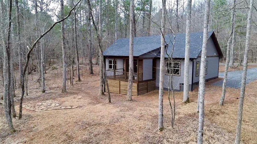 Exterior details and patio area of a home in , Ellijay (Image 11).