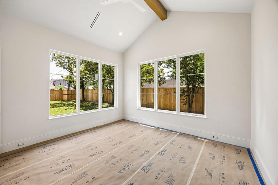 This versatile first-floor room offers the flexibility to be used as a game room, gym, or guest suite. A full guest bathroom with a shower is located adjacent to the space and can also be accessed from the hallway to the pavilion.