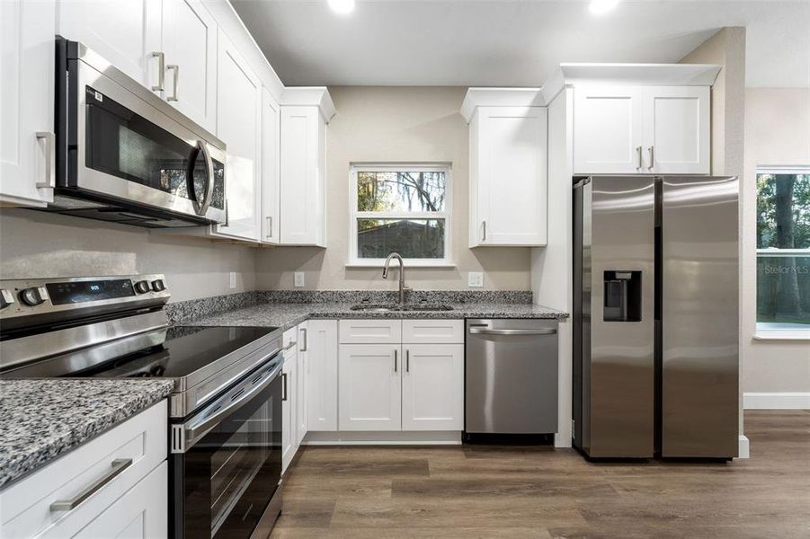 Furnished interior view inside a new home in , Gainesville (Image 6).