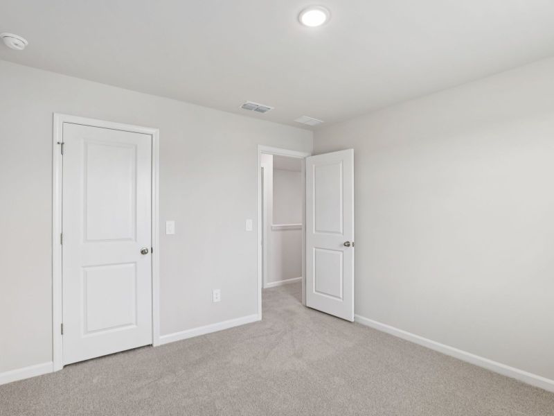 Spacious, unfurnished interior of a new home in River Glen, Angier (Image 23).