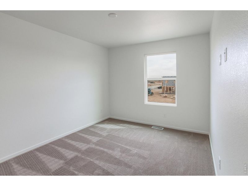Spacious, unfurnished interior of a new home in Bloom Trailblazer Collection - Single Family Homes, Fort Collins (Image 32).