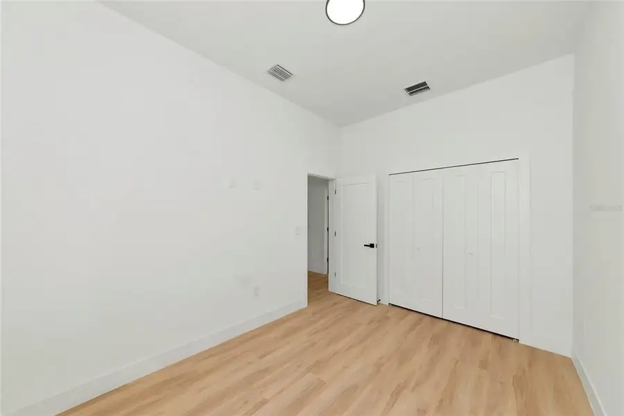 Spacious, unfurnished interior of a new home in , North Port (Image 37).