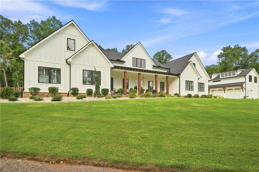 Front exterior of a new home in , Ball Ground, GA, highlighting curb appeal (Image 21). Front exterior of a new home in , Ball Ground, GA, highlighting curb appeal (Image 21).