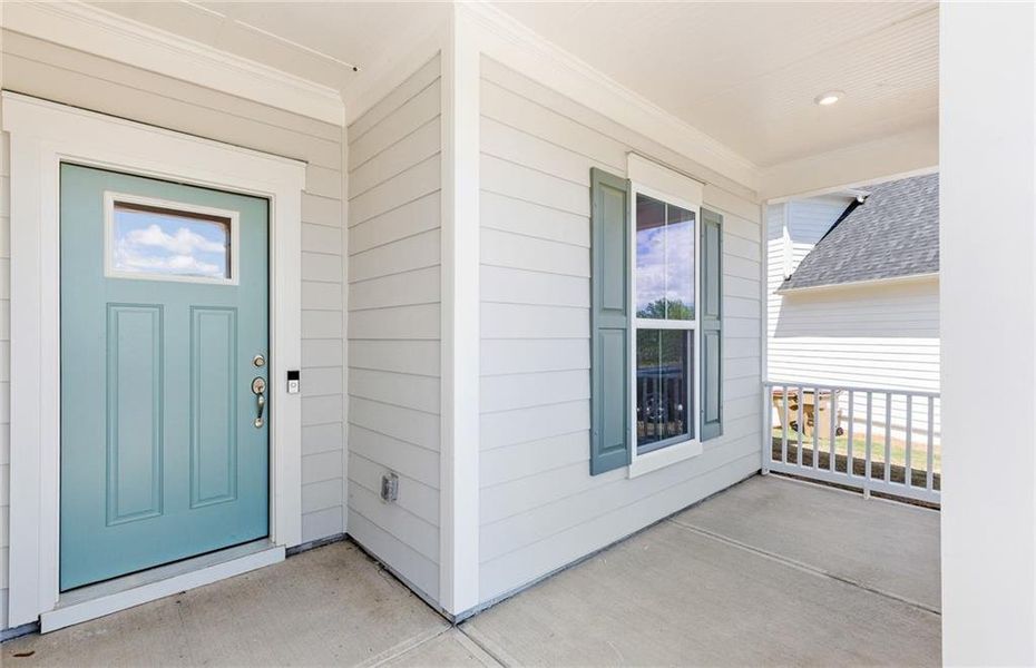 Exterior details and patio area of a home in Reunion, Flowery Branch (Image 2).