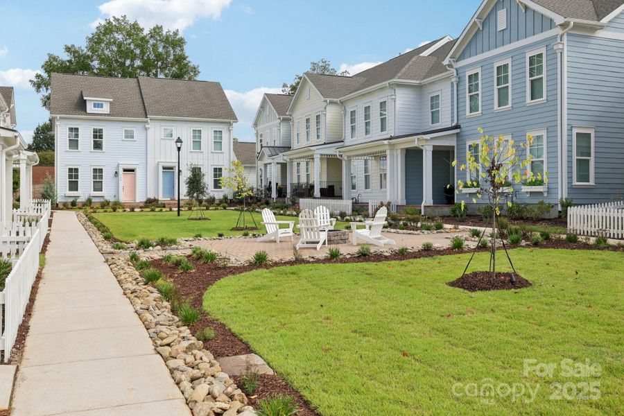 Exterior details and patio area of a home in Walk23, Huntersville (Image 19).
