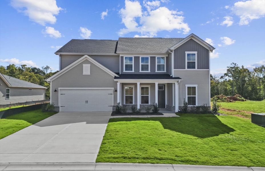 Front exterior of a new home in Sweetwater Hills, Moore, SC, highlighting curb appeal (Image 1).