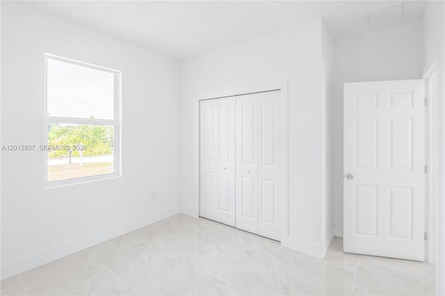 Spacious, unfurnished interior of a new home in , Lehigh Acres (Image 19).