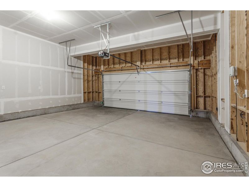 Photos of previously built home. This home features a three car garage.
