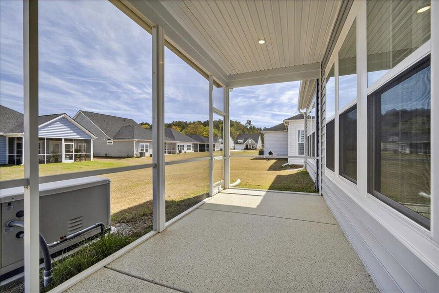 Exterior details and patio area of a home in Horizons at Summers Corner | 55+, Summerville (Image 25).