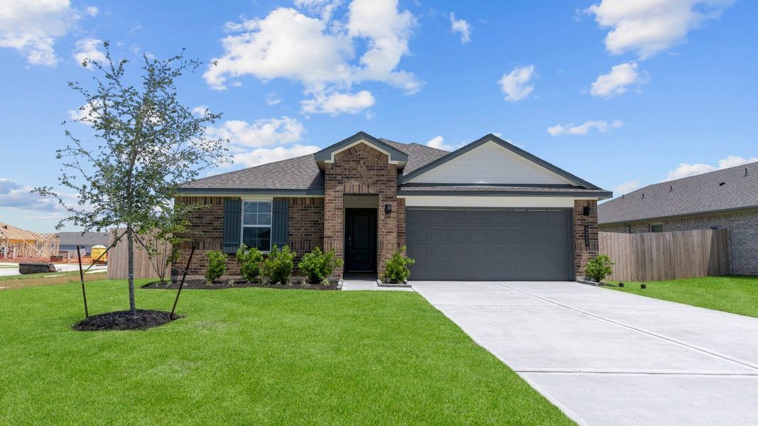 Representative exterior photo of a completed home built from the Cali by D.R. Horton in Caldwell Crossing, Iowa Colony, TX (Image 1). Representative exterior photo of a completed home built from the Cali by D.R. Horton in Caldwell Crossing, Iowa Colony, TX (Image 1).