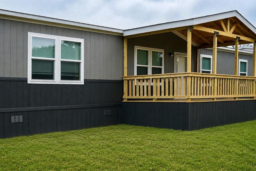Exterior details and patio area of a home in , Runaway Bay (Image 24).