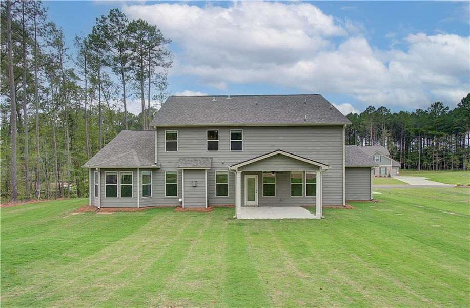 Exterior details and patio area of a home in Riverbend Overlook, Fayetteville (Image 3).
