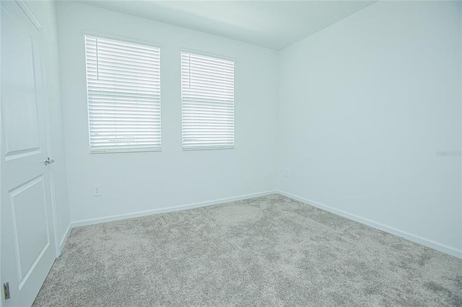 Spacious, unfurnished interior of a new home in Tohoqua, Kissimmee (Image 25).