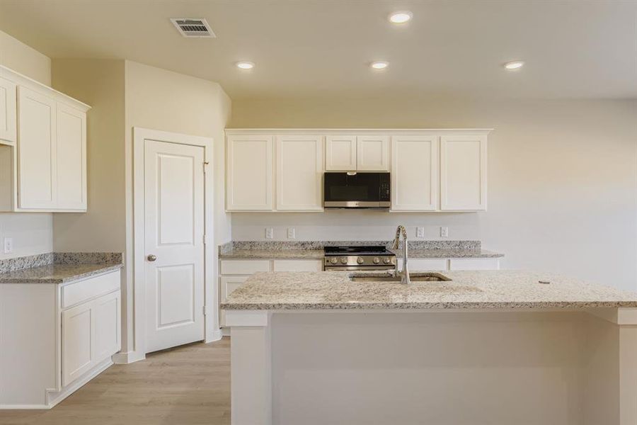 Furnished interior view inside a new home in Sperling Farms, Ferris (Image 9).
