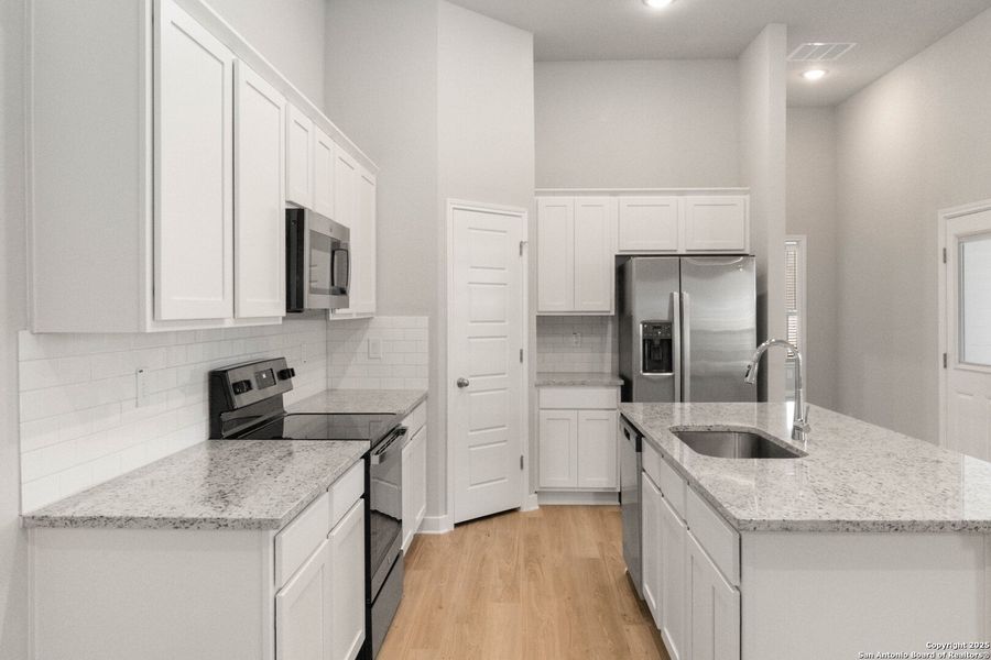 Furnished interior view inside a new home in Emma Park, Buda (Image 25). Furnished interior view inside a new home in Emma Park, Buda (Image 25).