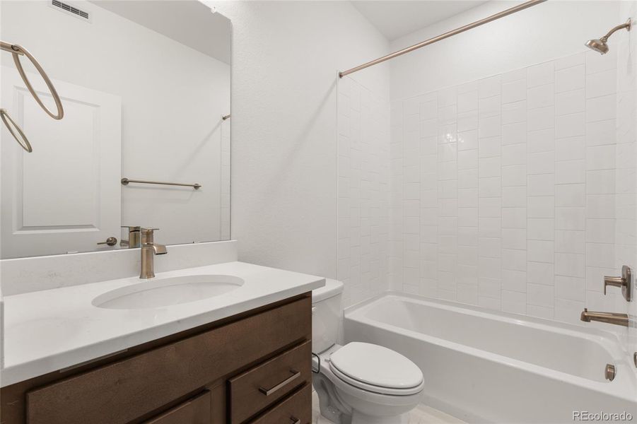 Furnished interior view inside a new home in Harvest Crossing, Aurora (Image 11).