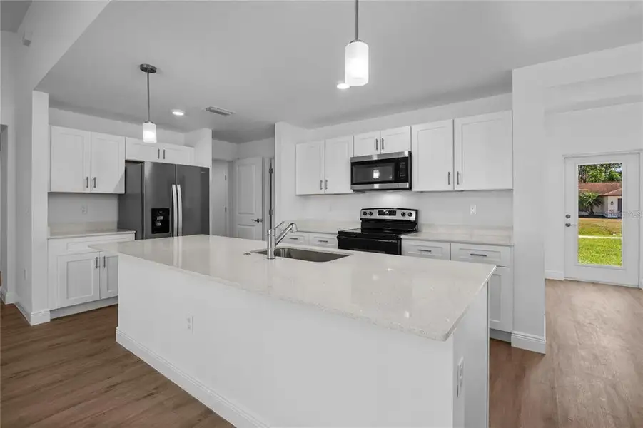 Furnished interior view inside a new home in , North Port (Image 3).