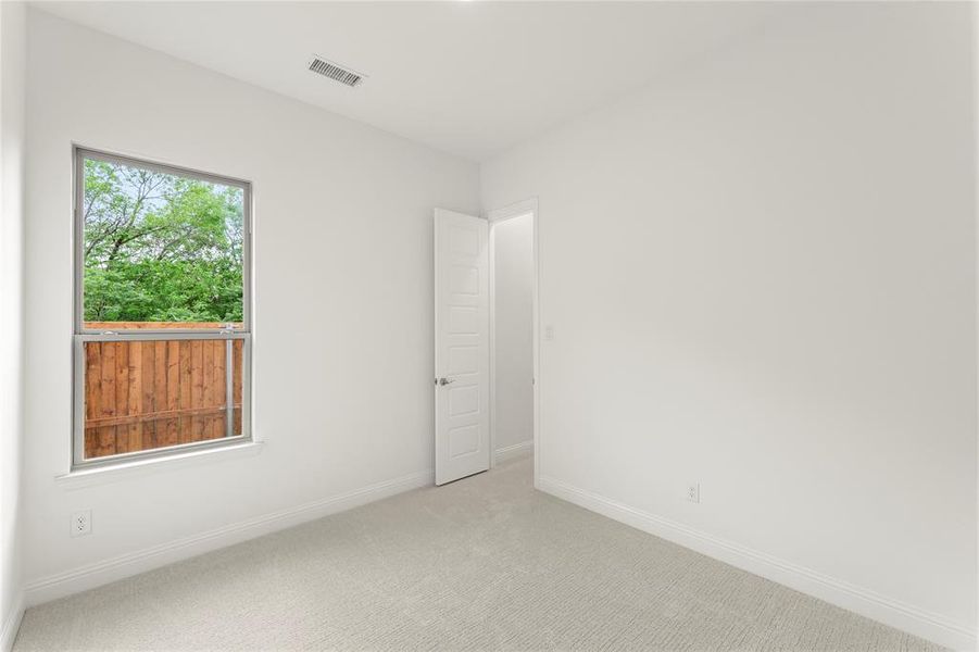 Spacious, unfurnished interior of a new home in Villas at Long Branch, Rowlett (Image 25).