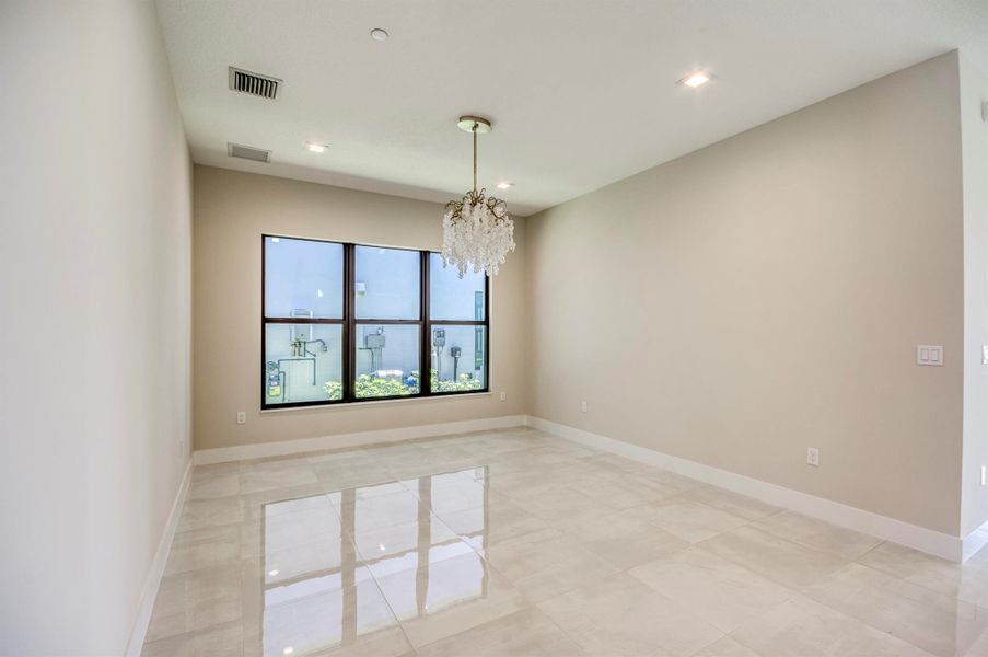 Furnished interior view inside a new home in Apex at Avenir, Palm Beach Gardens (Image 32).