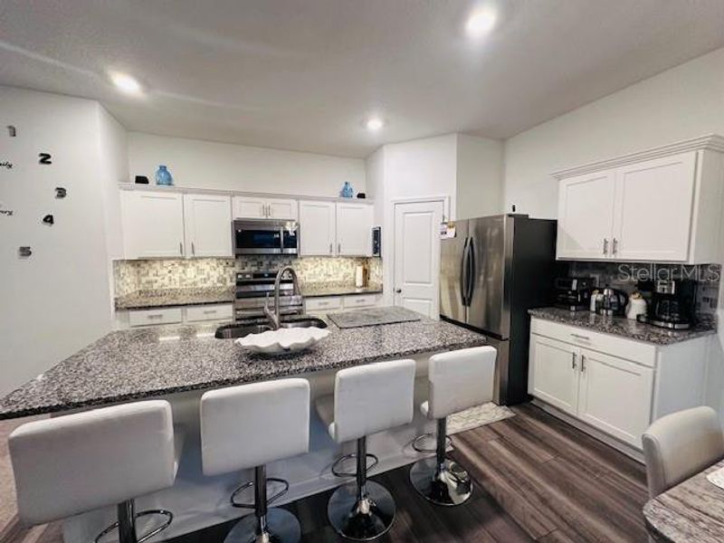 Furnished interior view inside a new home in Hidden Creek, Zephyrhills (Image 7).