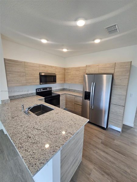 Furnished interior view inside a new home in , Orlando (Image 8).