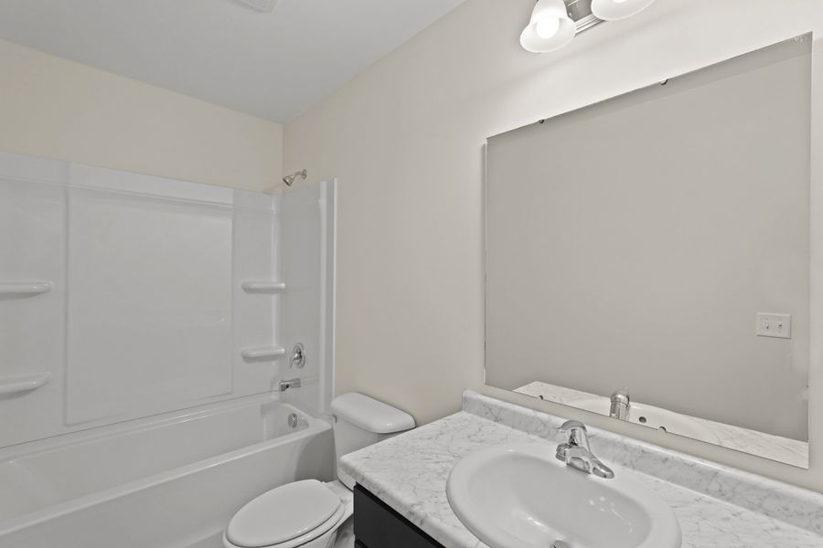 Representative furnished interior of a home built from the The Anderson by RTS Homes in Doctor's Creek, Ludowici (Image 16).