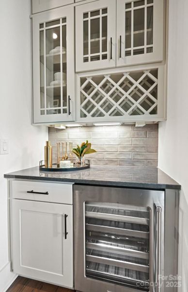 Butler's Pantry off of Dining Room with Stacked Cabinets and Space for Future Wine Chiller.  Representative Photo