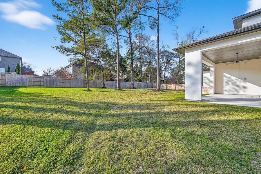 Exterior details and patio area of a home in Stewart’s Forest, Conroe (Image 26). Exterior details and patio area of a home in Stewart’s Forest, Conroe (Image 26).