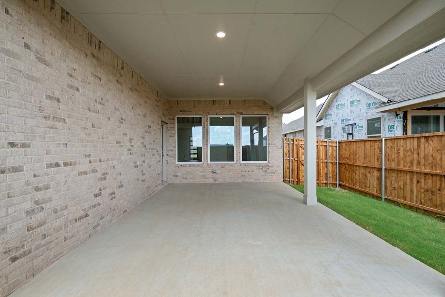 Exterior details and patio area of a home in Timberbrook, Justin (Image 3).