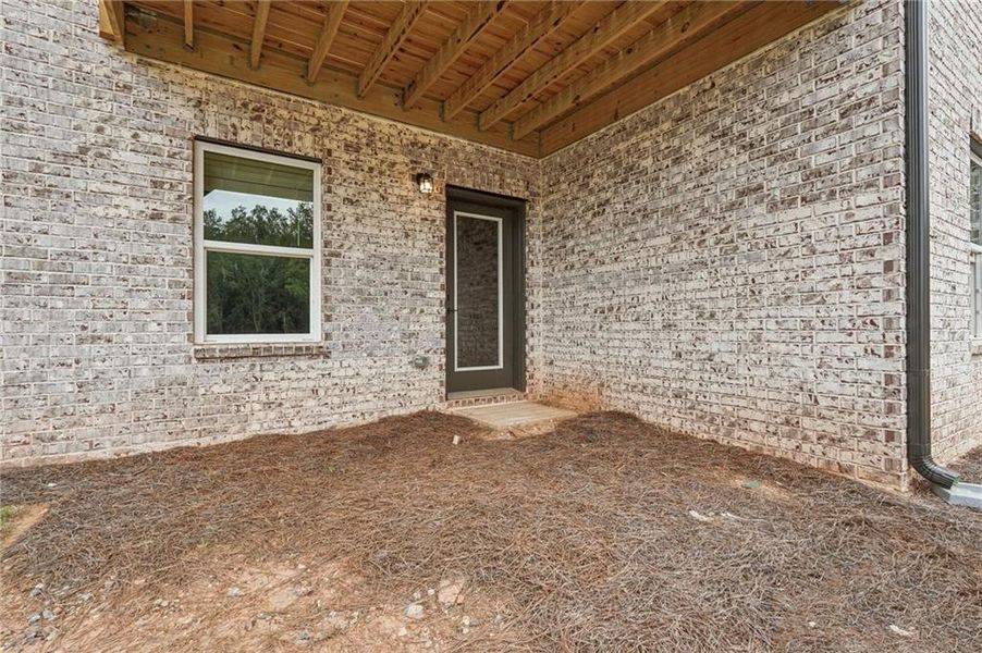 Exterior details and patio area of a home in Hemingway - Reserve Series, Cumming (Image 36).