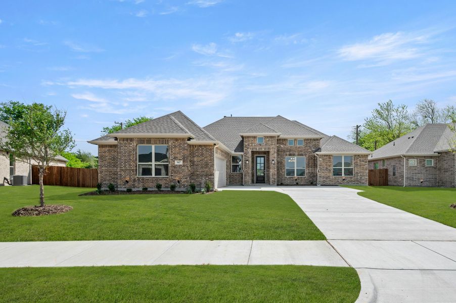 Representative exterior photo of a completed home built from the Lodge (Courtyard) by Kindred Homes in Kentsdale Farms, DeSoto, TX (Image 33).
