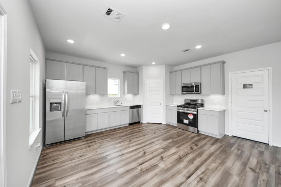 Furnished interior view inside a new home in Hill and Dale Ranch, Splendora (Image 6).