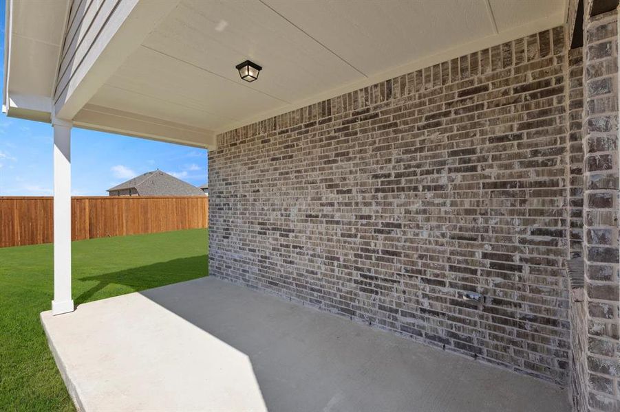 Exterior details and patio area of a home in Devonshire 40s, Forney (Image 3).